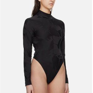 Nike Sportswear Tech Pack Women’s Bodysuit